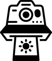 Solid black icon for instant camera vector