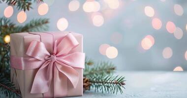in stunning 4K resolution captures a beautifully wrapped gift box with a pink ribbon, set against a festive backdrop featuring pine branches and twinkling lights video