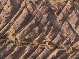 Rock surface from machine drilling photo