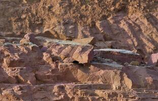 Rock surface from machine drilling photo
