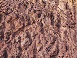 Rock surface from machine drilling photo