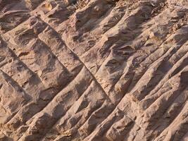 Rock surface from machine drilling photo