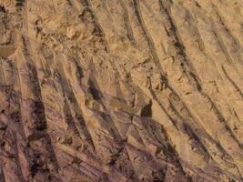 Rock surface from machine drilling photo