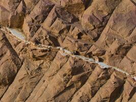 Rock surface from machine drilling photo