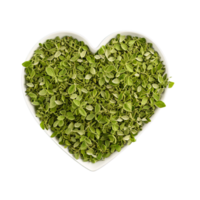 Oregano green dried leaves loosely scattered in heart formation Spices food and culinary concept showcasing png