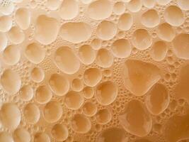 Drops of ice on an iced coffee glass photo
