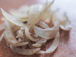 Clipped fingernails and toenails piled up in clumps. photo