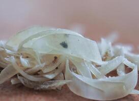 Clipped fingernails and toenails piled up in clumps. photo