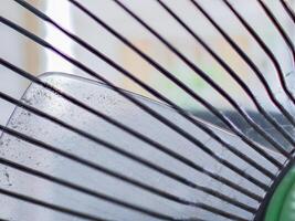 Dust and rust on fan blades and grilles photo