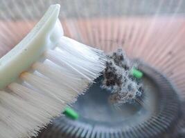 Dust and rust on fan blades and grilles photo