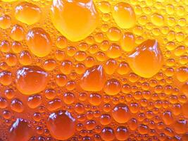 Drops of ice on an iced coffee glass photo