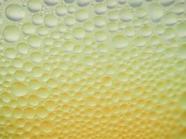Drops of ice on an iced coffee glass photo