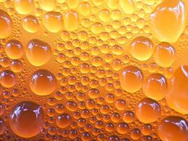 Drops of ice on an iced coffee glass photo