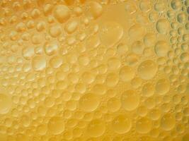 Drops of ice on an iced coffee glass photo