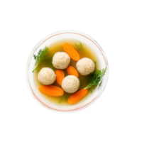 Matzo ball soup a clear chicken broth with fluffy matzo balls and thinly sliced carrots png