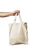 Hand holding a tote bag, isolated against a transparent background png