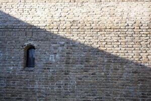Stone texture in Tallinn. Ancient wall of stones with gray color. Background. Template. For design. Horizontal. photo