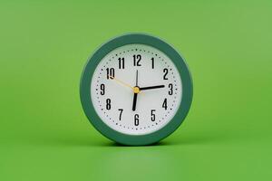 Alarm clock. Studio photo, time concept and working with precious time. photo