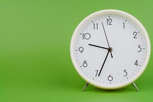Alarm clock. Studio photo, time concept and working with precious time. photo