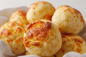 Close-up of Golden-Brown Cheesy Bread Rolls photo