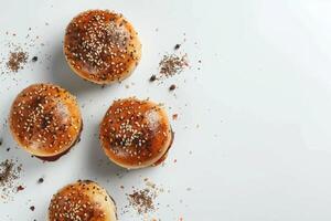 Four Sesame-Seeded Burger Buns with Spices photo