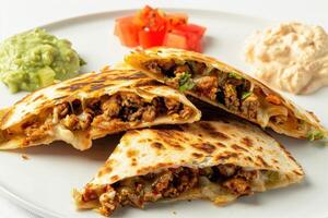 Three Crispy Quesadillas with Cheese and Ground Beef Filling photo