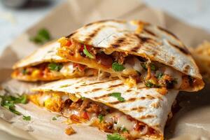Close-up of Cheesy Quesadillas with Meat and Cilantro Garnish photo