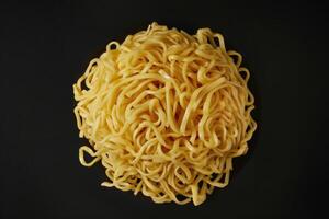 Close-up of a Heap of Cooked Egg Noodles photo