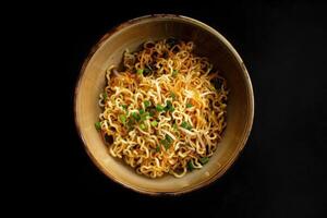 Close-up of Noodles with Green Onions in a Brown Bowl photo