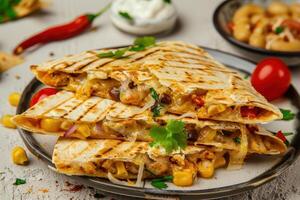 Three Crispy Quesadillas with Melted Cheese, Corn, and Cilantro photo