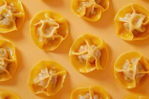 Golden Dumplings on a Yellow Background photo
