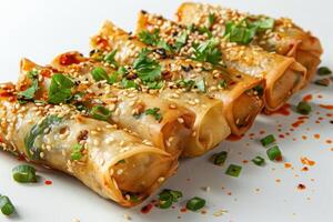 Sesame Seed and Spring Onion Topped Crispy Spring Rolls photo