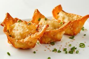 Three Crispy Fried Wontons with Sesame Seeds and Green Onions photo