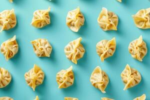 A Pattern of Steamed Dumplings on a Blue Background photo