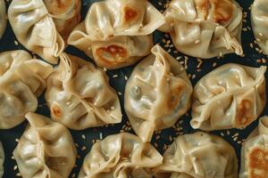 Close-up of Steamed Dumplings with Sesame Seeds photo