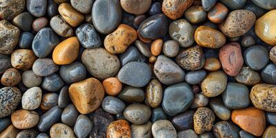 Texture of smooth pebbles on a beach photo