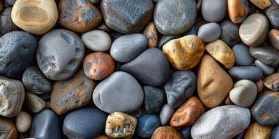 Texture of smooth pebbles on a beach photo