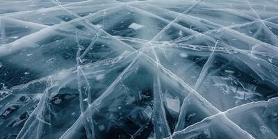 Intricate ice patterns on a frozen lake photo