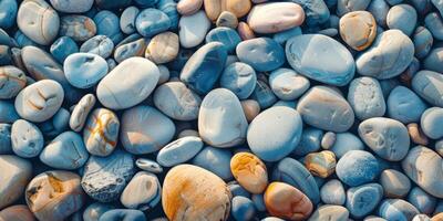 Texture of smooth pebbles on a beach photo