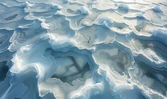 The frozen surface of the Arctic Ocean at the North Pole, with intricate patterns of ice and snow photo