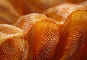 Extreme close-up macro photography of the intricate weave pattern of a piece of silk fabric photo