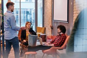 Office Colleagues Enjoying Break Time Together. photo