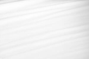 Abstract White Bedding Sheets or White wrinkled fabric background texture and Texture with copy-space Creased or wrinkled white fabric,Soft focus photo