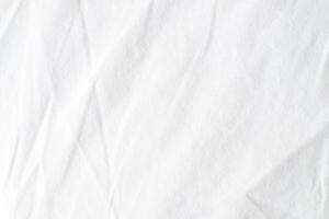 Abstract White Bedding Sheets or White wrinkled fabric background texture and Texture with copy-space Creased or wrinkled white fabric,Soft focus photo