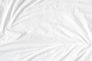 Abstract White Bedding Sheets or White wrinkled fabric background texture and Texture with copy-space Creased or wrinkled white fabric,Soft focus photo