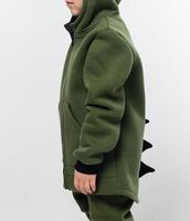 Child in Green Dinosaur Hoodie Side View photo