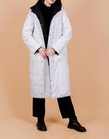 Full-Length White Coat. Vertical photo