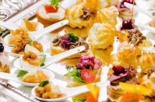 Assorted Appetizers on Silver Tray photo