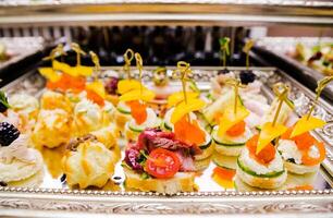 Elegant Assorted Canapes on Silver Tray photo