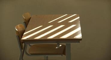 Empty classroom with wooden desks and sunlight casting shadow lines photo